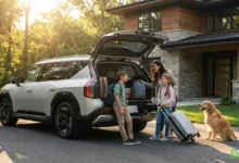 Best electric cars for families 2026 Kia EV9 with happy family loading luggage